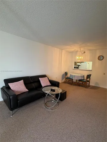 $100,000 | 9101 Lime Bay Boulevard, Unit 302, Tamarac, FL 33321