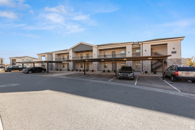 6231 Winding Way, Unit K105 Hurricane, UT 84737 - Photo 17 of 20 View of property with covered and uncovered parking