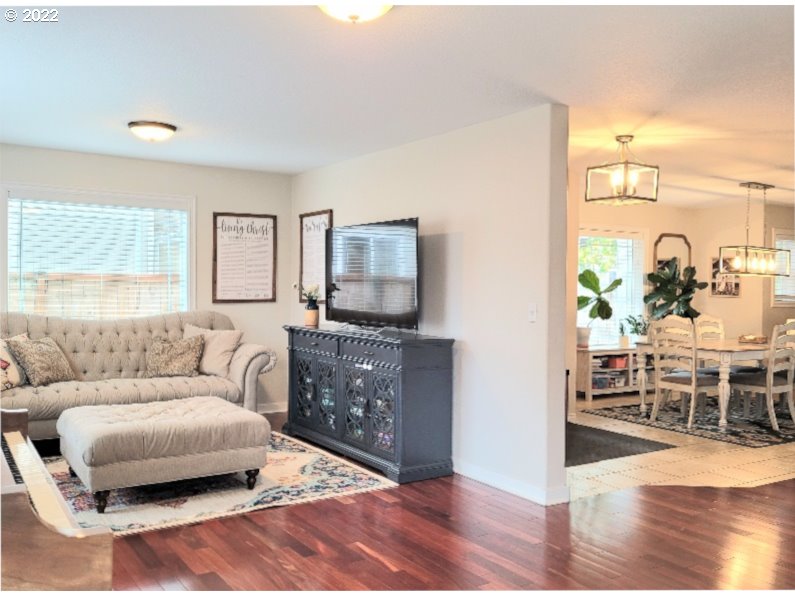 1618 Kellogg Road Springfield, OR 97477 - Photo 6 of 23 a living room with furniture and a flat screen tv