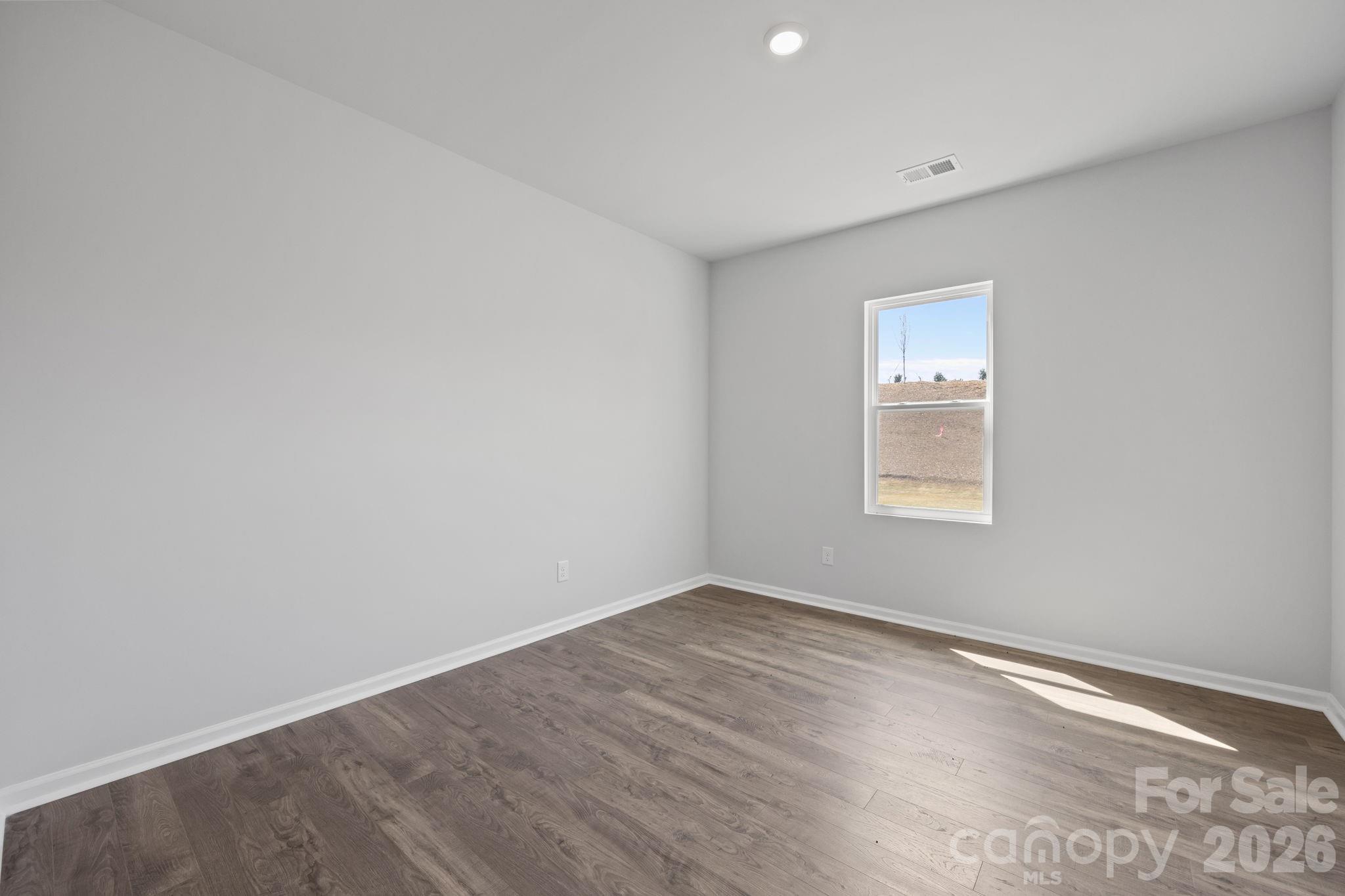 426 Brick House Road York, SC 29745 - Photo 20 of 35 an empty room with a workbench