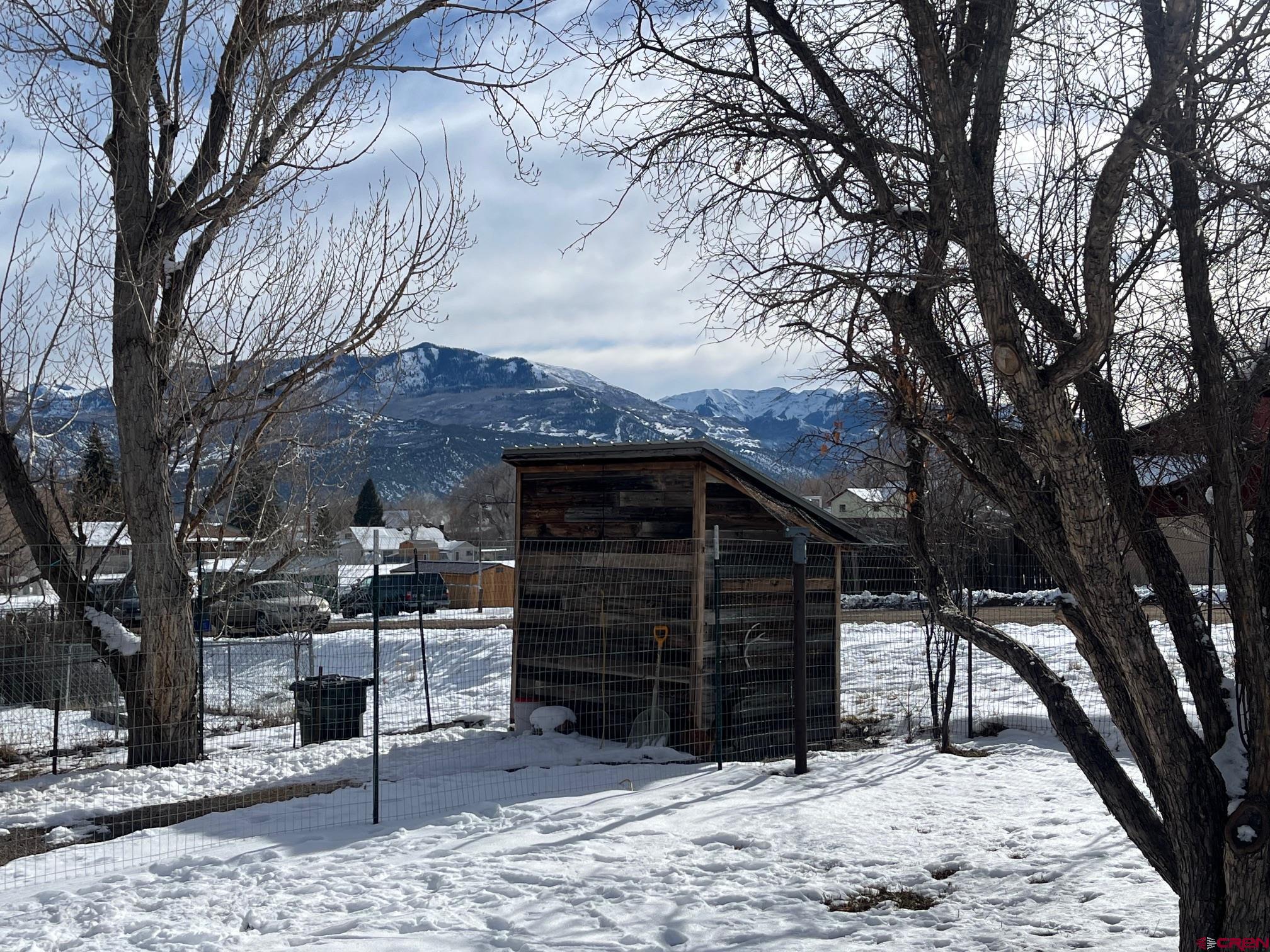 214 North Amelia Street Ridgway, CO 81432 - Photo 6 of 18 a view of a house with a yard