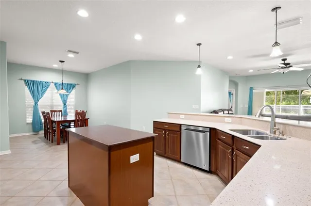 a spacious bedroom with a bed and window