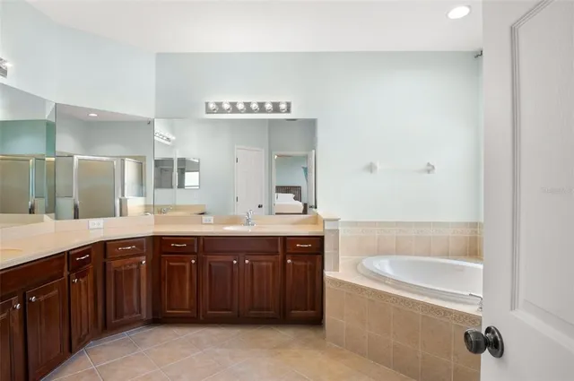 a view of a swimming pool with a patio