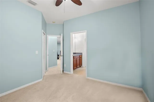 an aerial view of a house with outdoor space