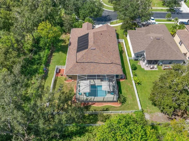 a large kitchen with stainless steel appliances kitchen island granite countertop a large counter top and oven