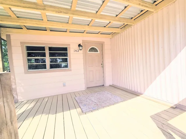a view of a backyard of a house