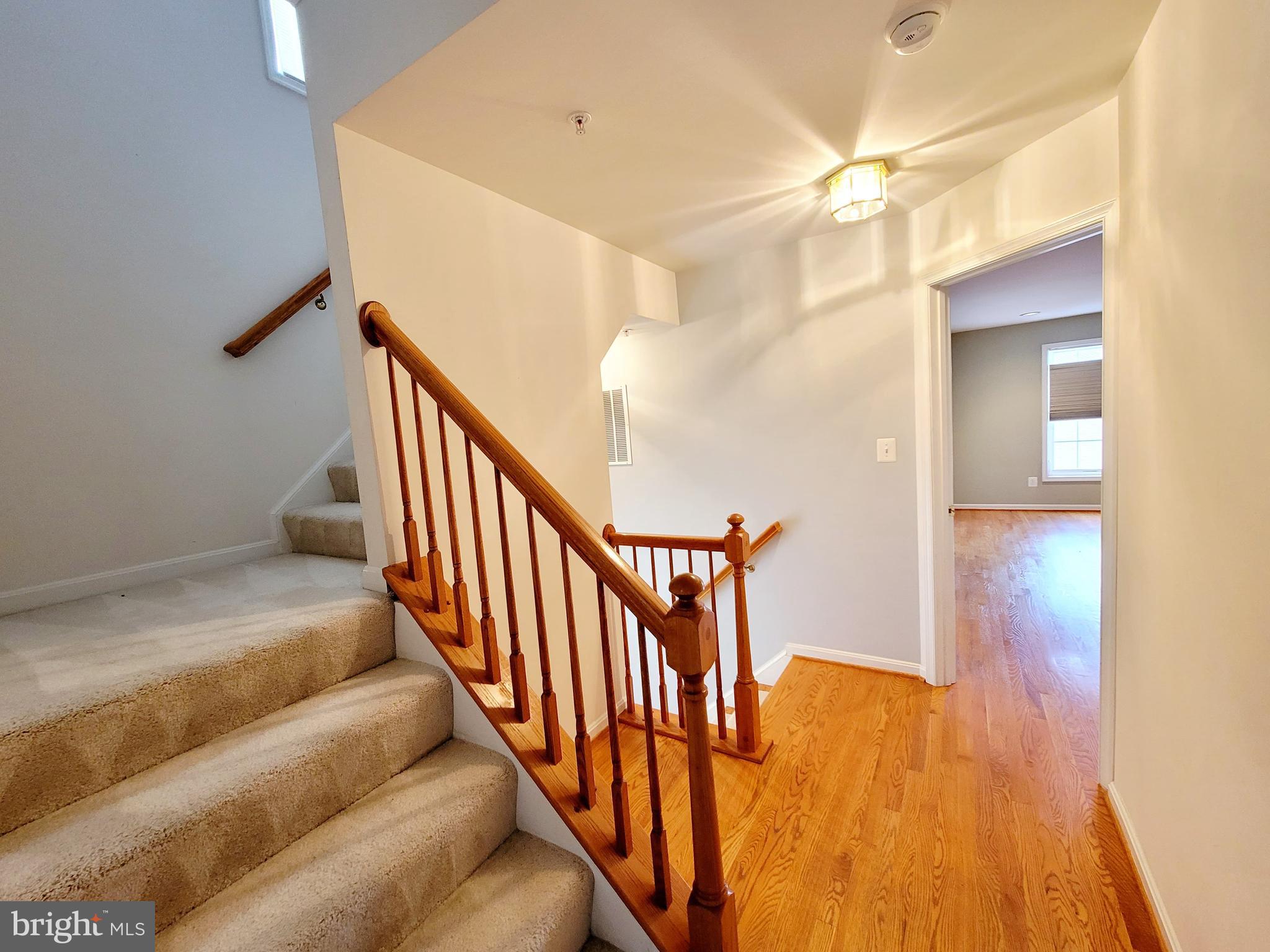3960 Addison Woods Road Frederick, MD 21704 - Photo 12 of 19 a view of entryway and hall with wooden floor