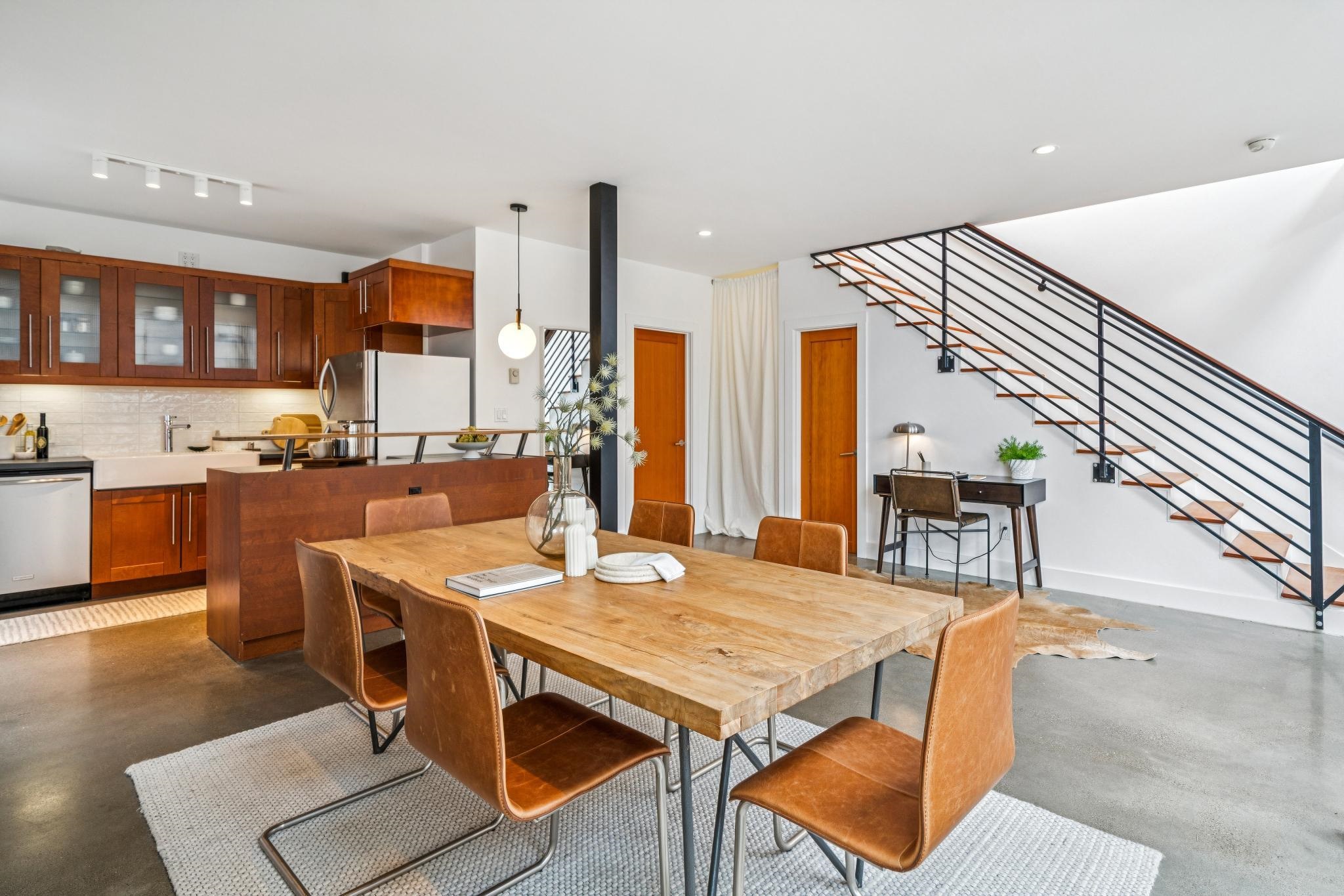 829 21st Street, Unit 3 Oakland, CA 94607 - Photo 15 of 47 Dining room featuring finished concrete flooring