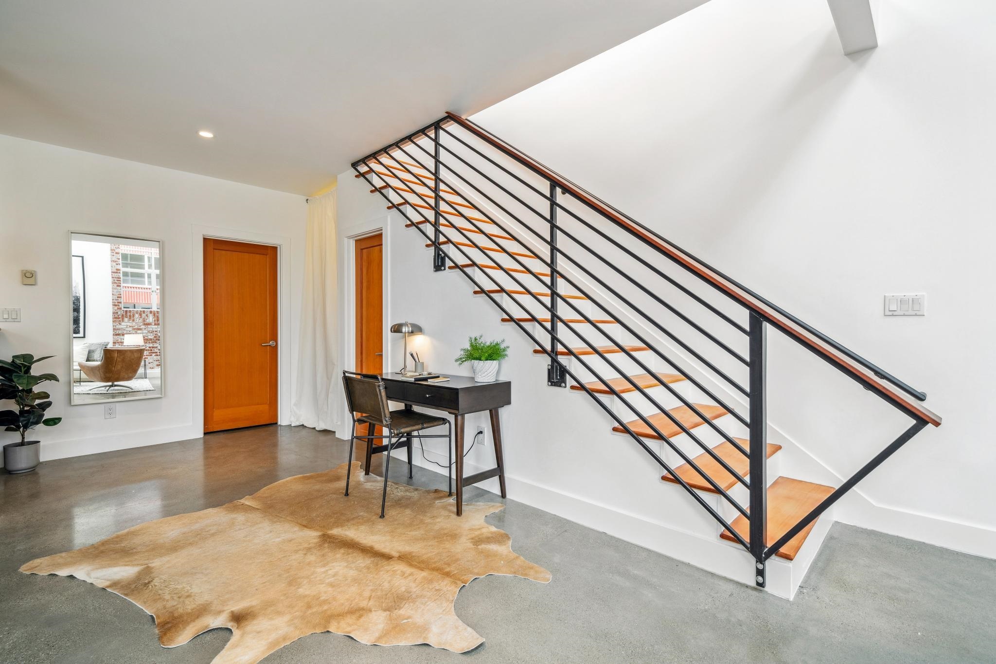829 21st Street, Unit 3 Oakland, CA 94607 - Photo 20 of 47 Stairs featuring concrete flooring and recessed lighting