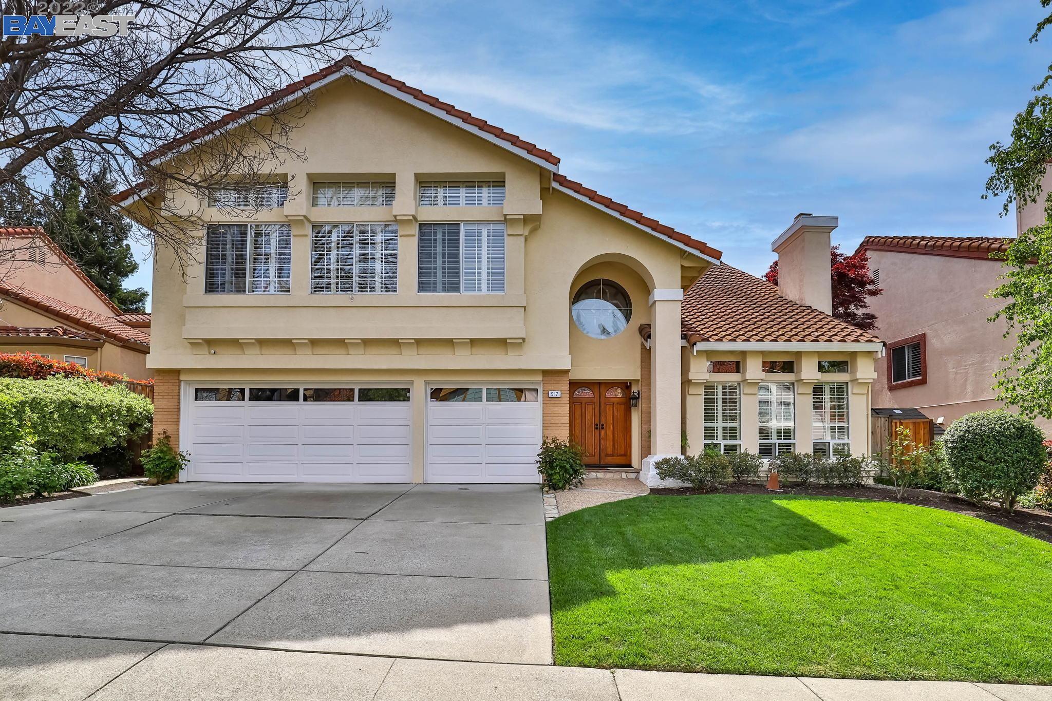517 Iris Lane San Ramon, CA 94582 - Photo 1 of 1 a front view of a house with a yard and garage