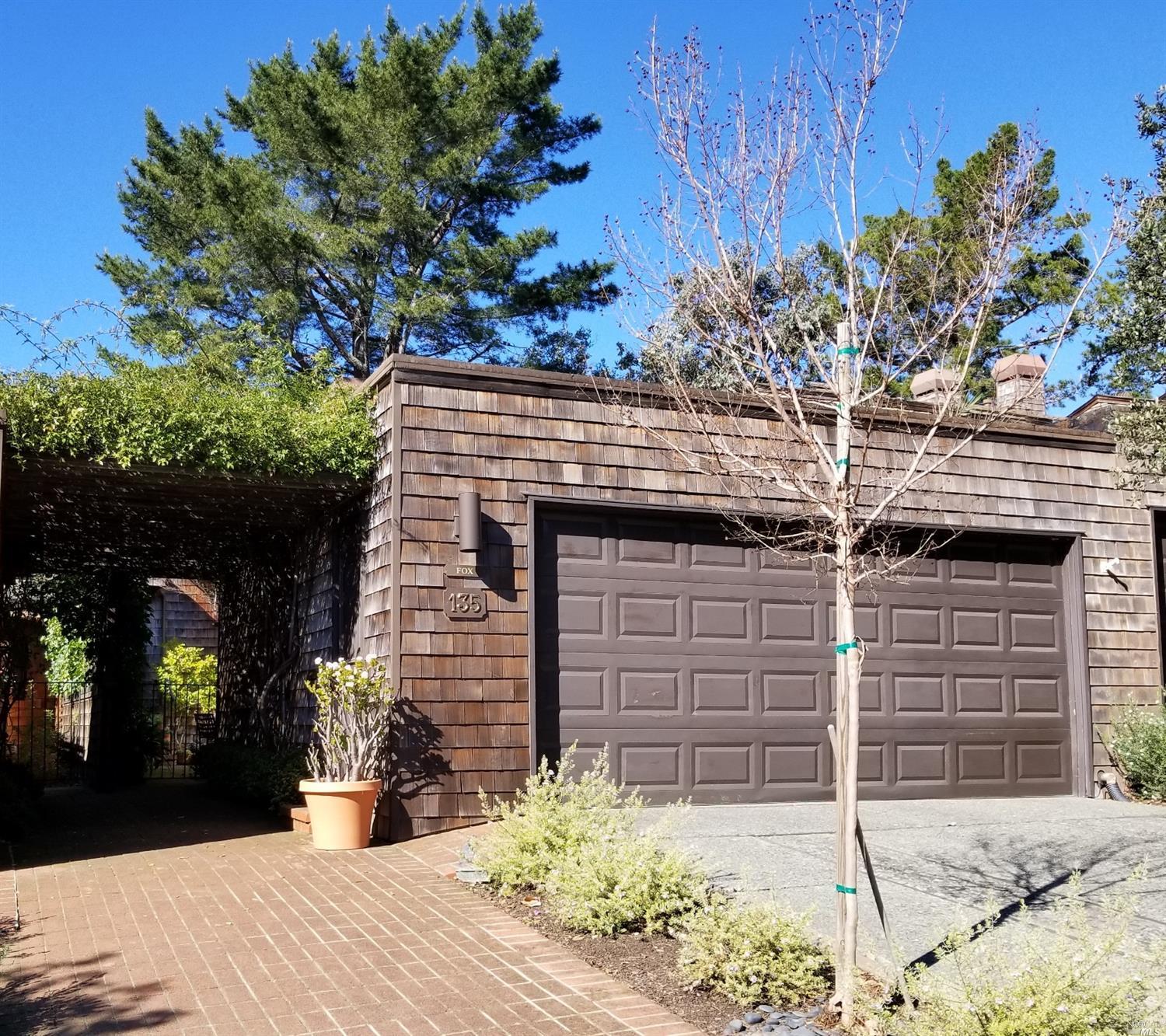 135 El Condor Court San Rafael, CA 94903 - Photo 1 of 1 a front view of a house with a tree