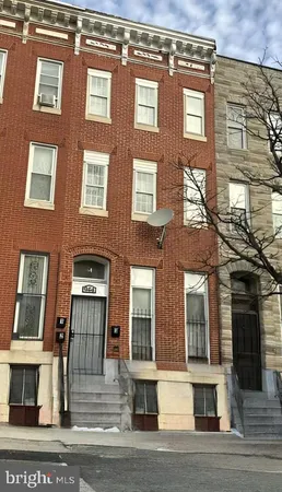 a front view of a multi story residential apartment building