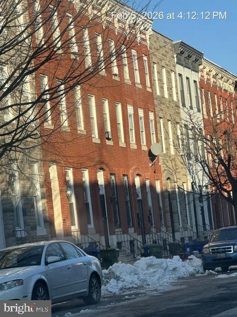 944 Harlem Avenue Baltimore, MD 21217 - Photo 8 of 9 a view of a car park in front of a building