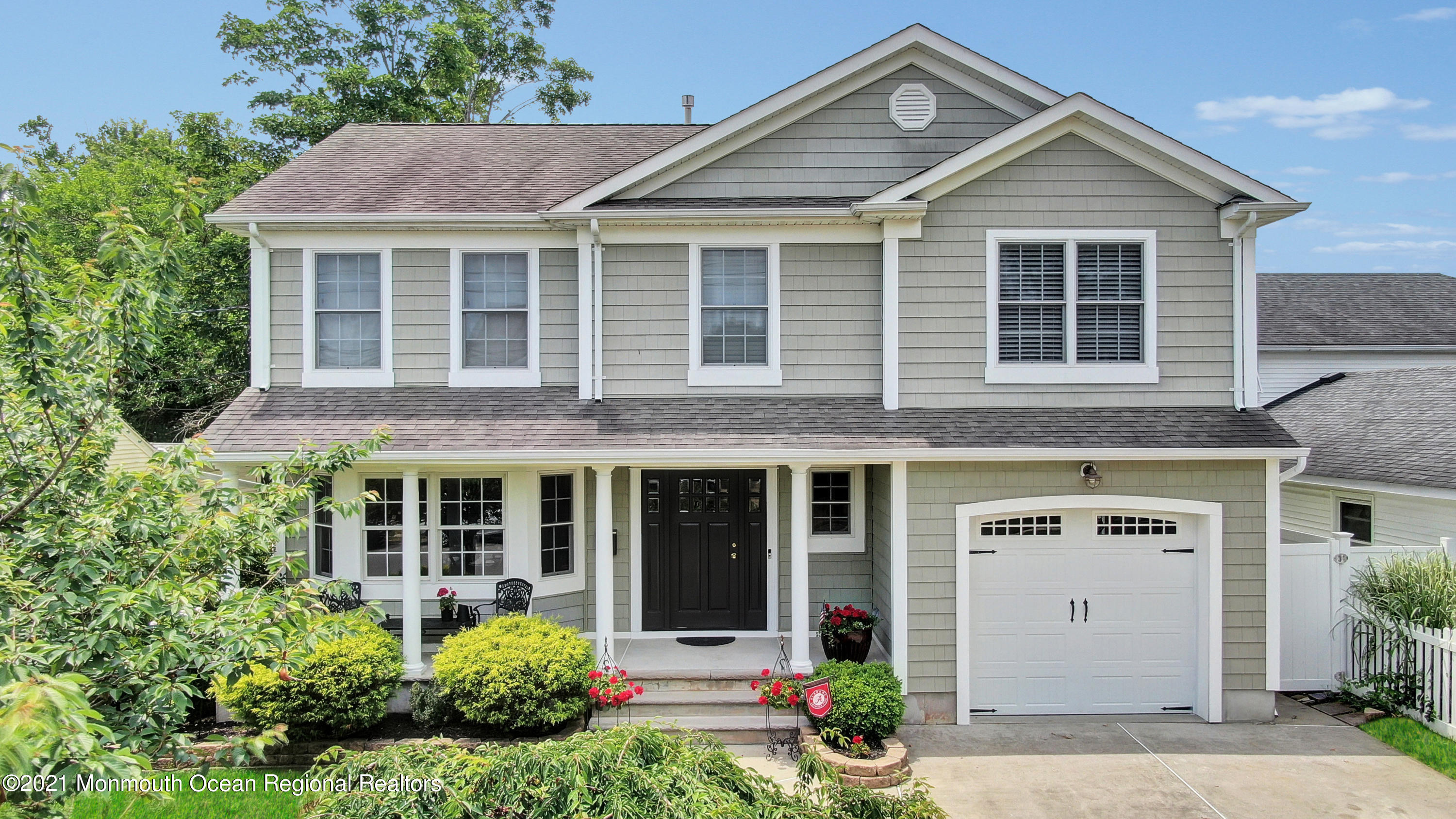 75 Minnesink Road Manasquan, NJ 08736 - Photo 50 of 53 front view of a house with a yard