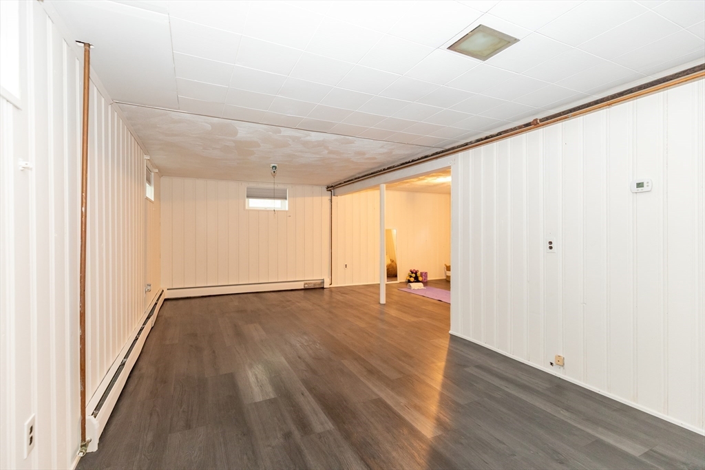 5 Ellen Road Burlington, MA 01803 - Photo 20 of 39 an empty room with wooden floor and windows