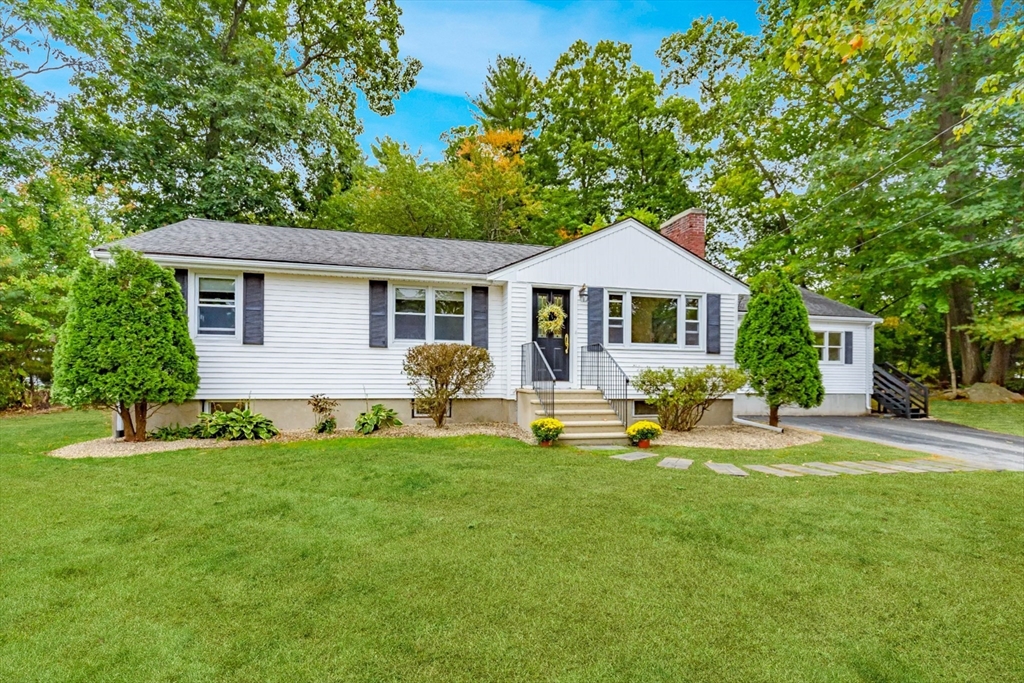 5 Ellen Road Burlington, MA 01803 - Photo 2 of 39 a front view of a house with a yard