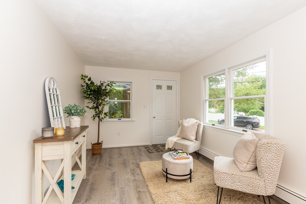 5 Ellen Road Burlington, MA 01803 - Photo 22 of 39 a living room with furniture and a large window
