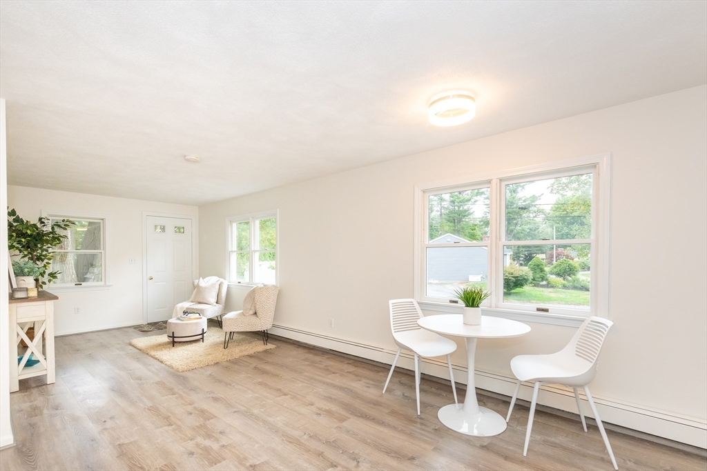 5 Ellen Road Burlington, MA 01803 - Photo 24 of 39 a living room with furniture and wooden floor