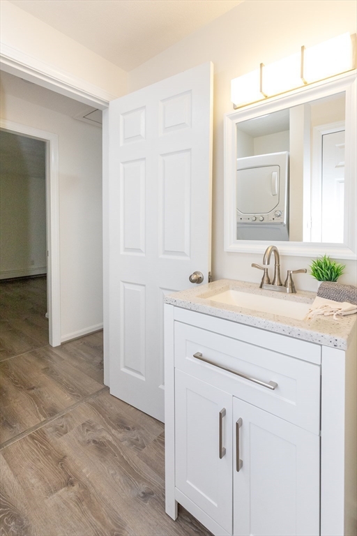 5 Ellen Road Burlington, MA 01803 - Photo 30 of 39 a bathroom with a sink and a mirror