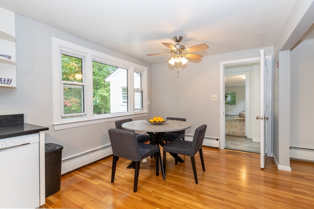 5 Ellen Road Burlington, MA 01803 - Photo 7 of 39 a view of a dining room with furniture and wooden floor
