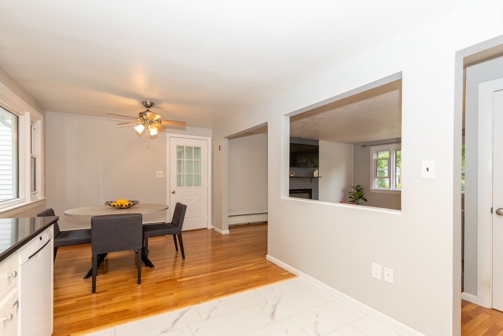 5 Ellen Road Burlington, MA 01803 - Photo 9 of 39 a view of a livingroom with wooden floor and furniture