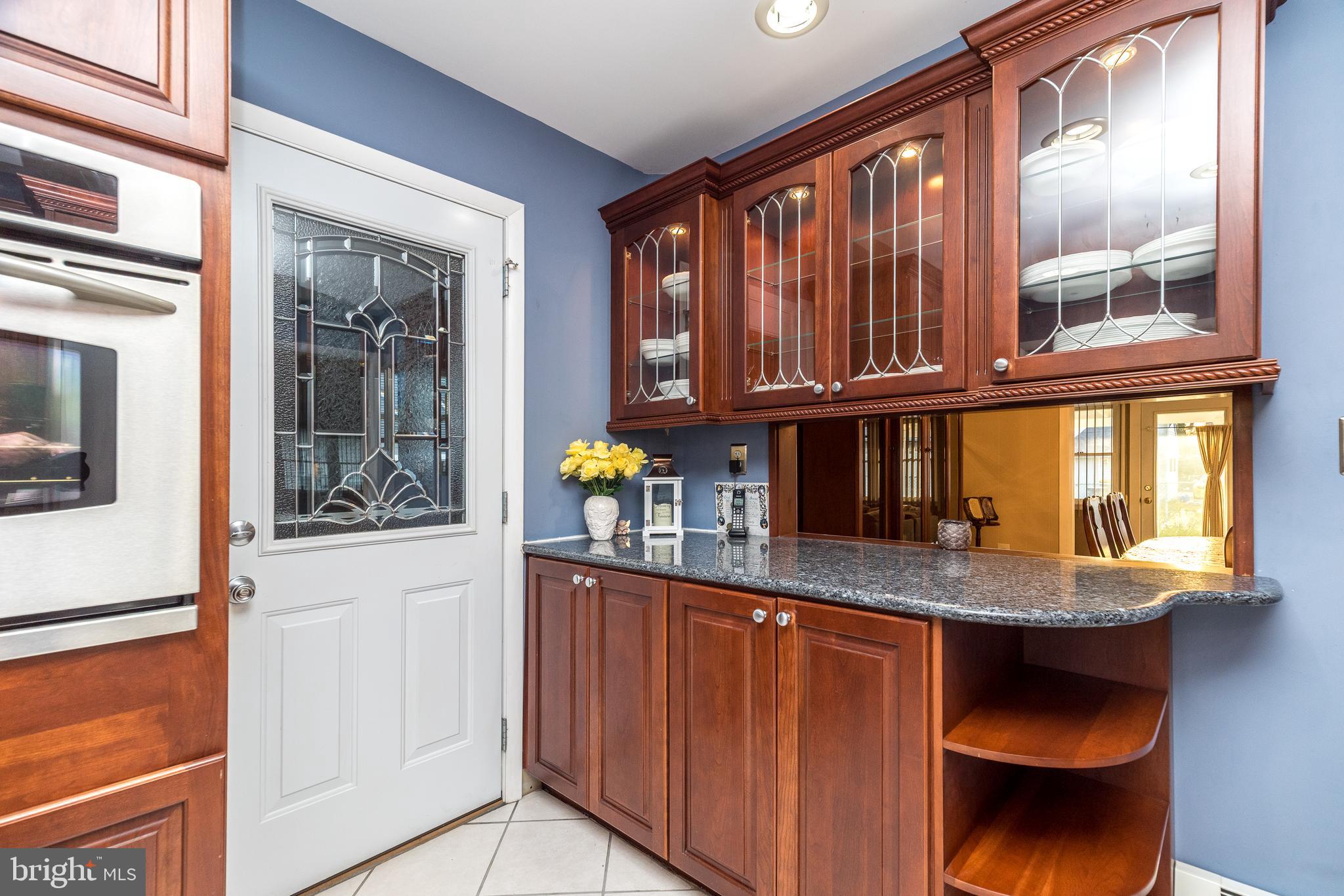 29 Hope Road Levittown, PA 19056 - Photo 14 of 49 a kitchen with granite countertop a sink cabinets and window