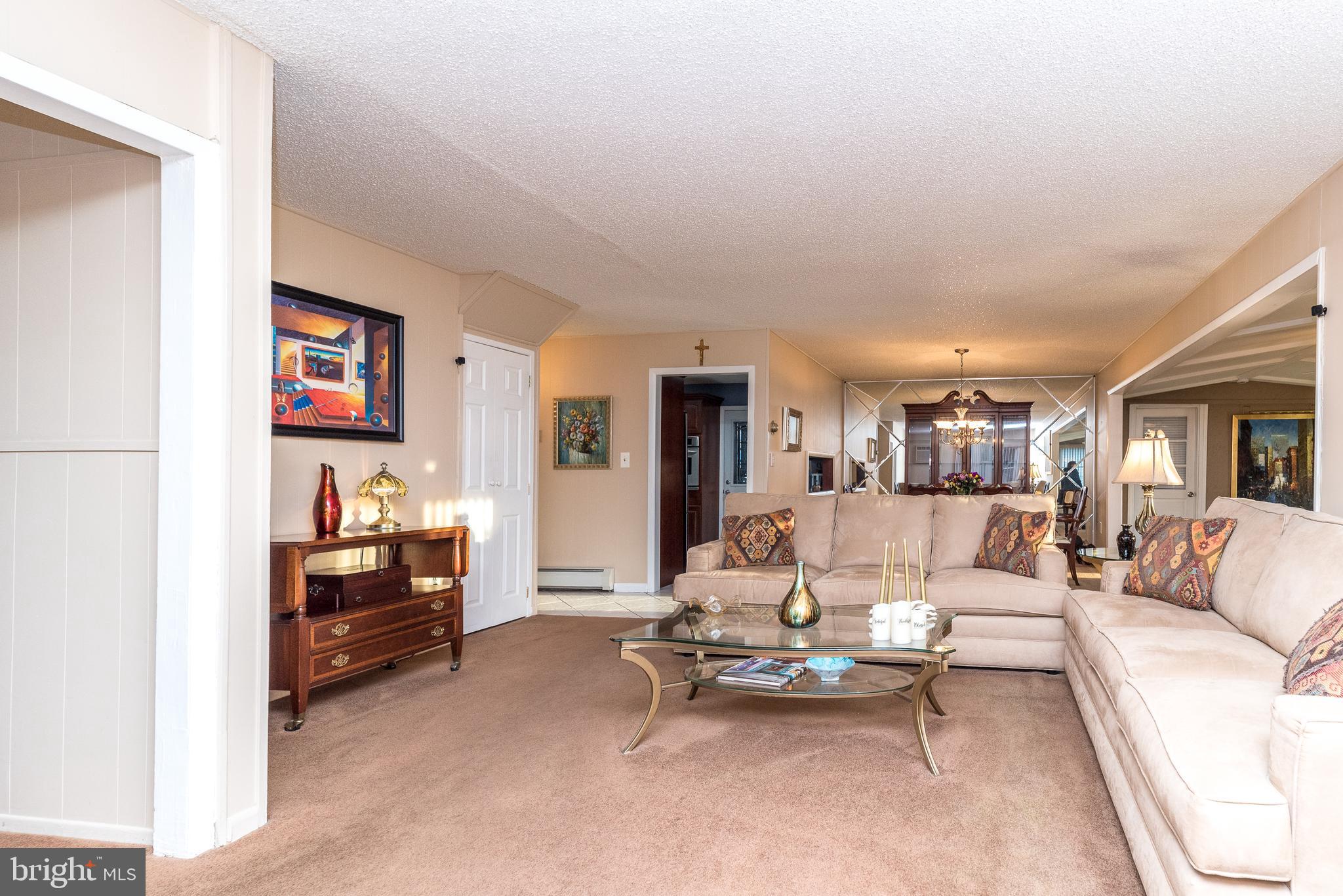 29 Hope Road Levittown, PA 19056 - Photo 21 of 49 a living room with furniture and a couch