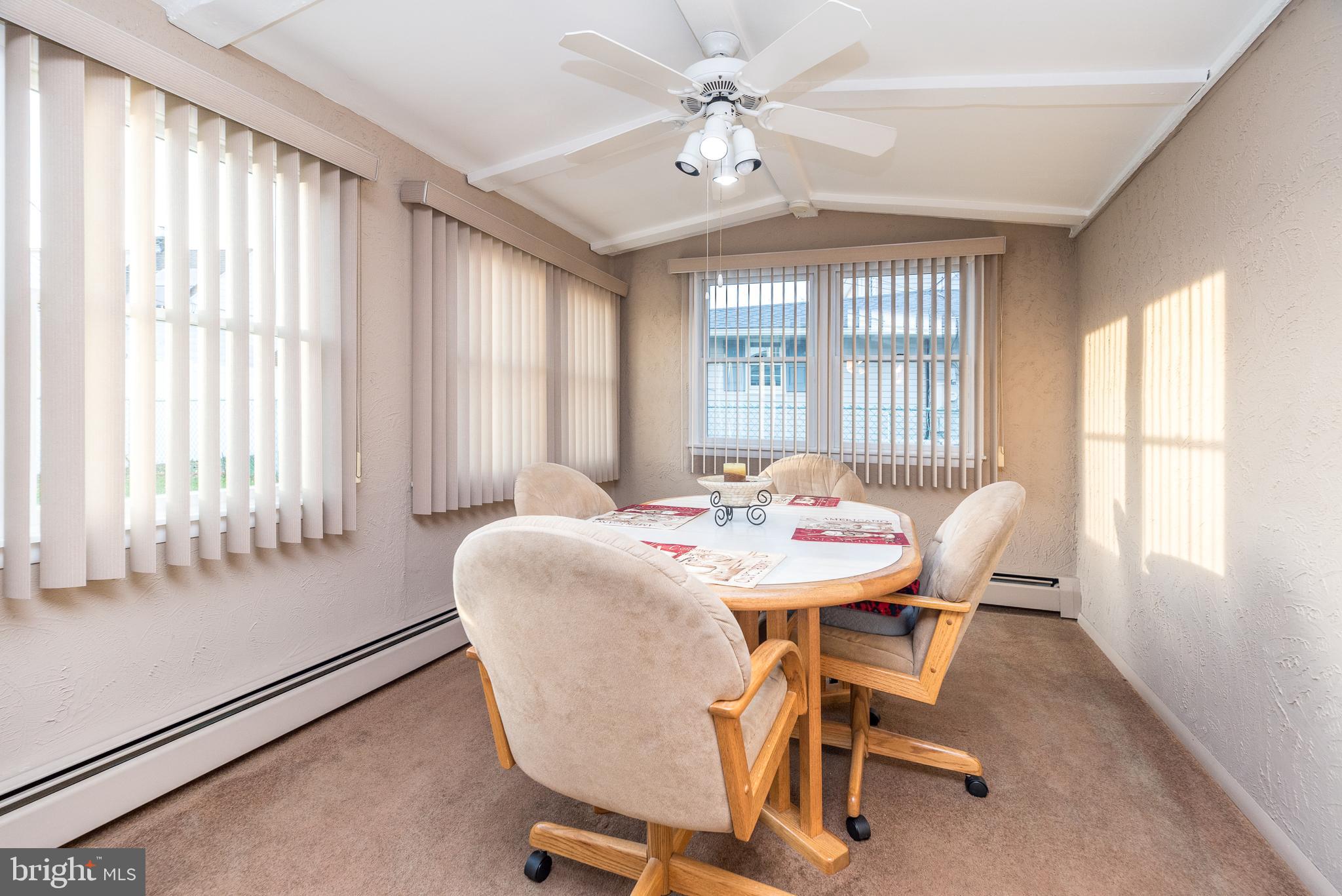 29 Hope Road Levittown, PA 19056 - Photo 23 of 49 a view of a dining room with furniture and window