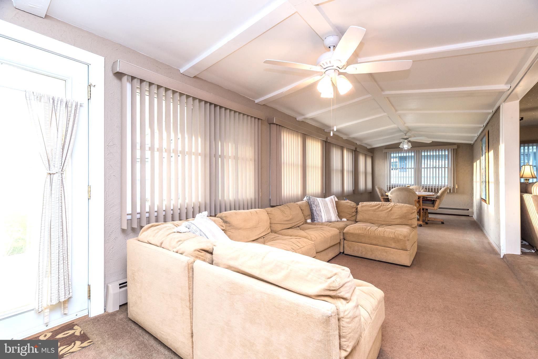 29 Hope Road Levittown, PA 19056 - Photo 27 of 49 a living room with furniture and a large window