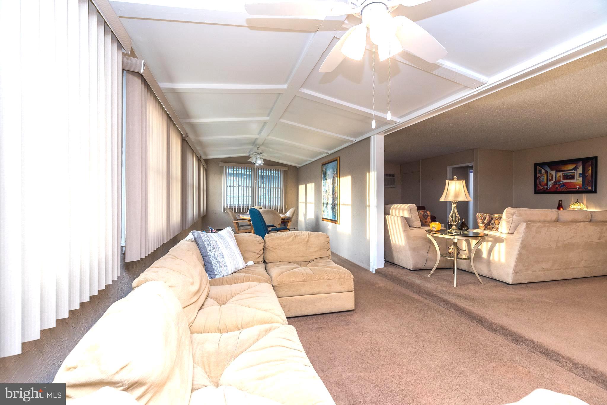 29 Hope Road Levittown, PA 19056 - Photo 28 of 49 a living room with furniture and a large window