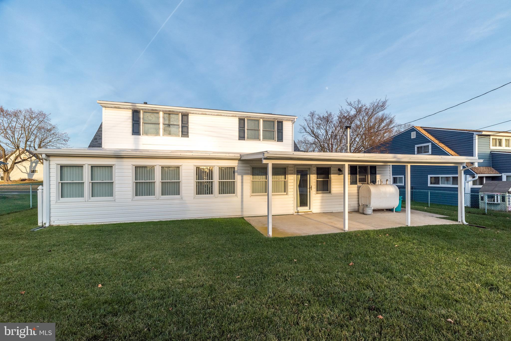 29 Hope Road Levittown, PA 19056 - Photo 47 of 49 a house that has a big yard with plants and trees