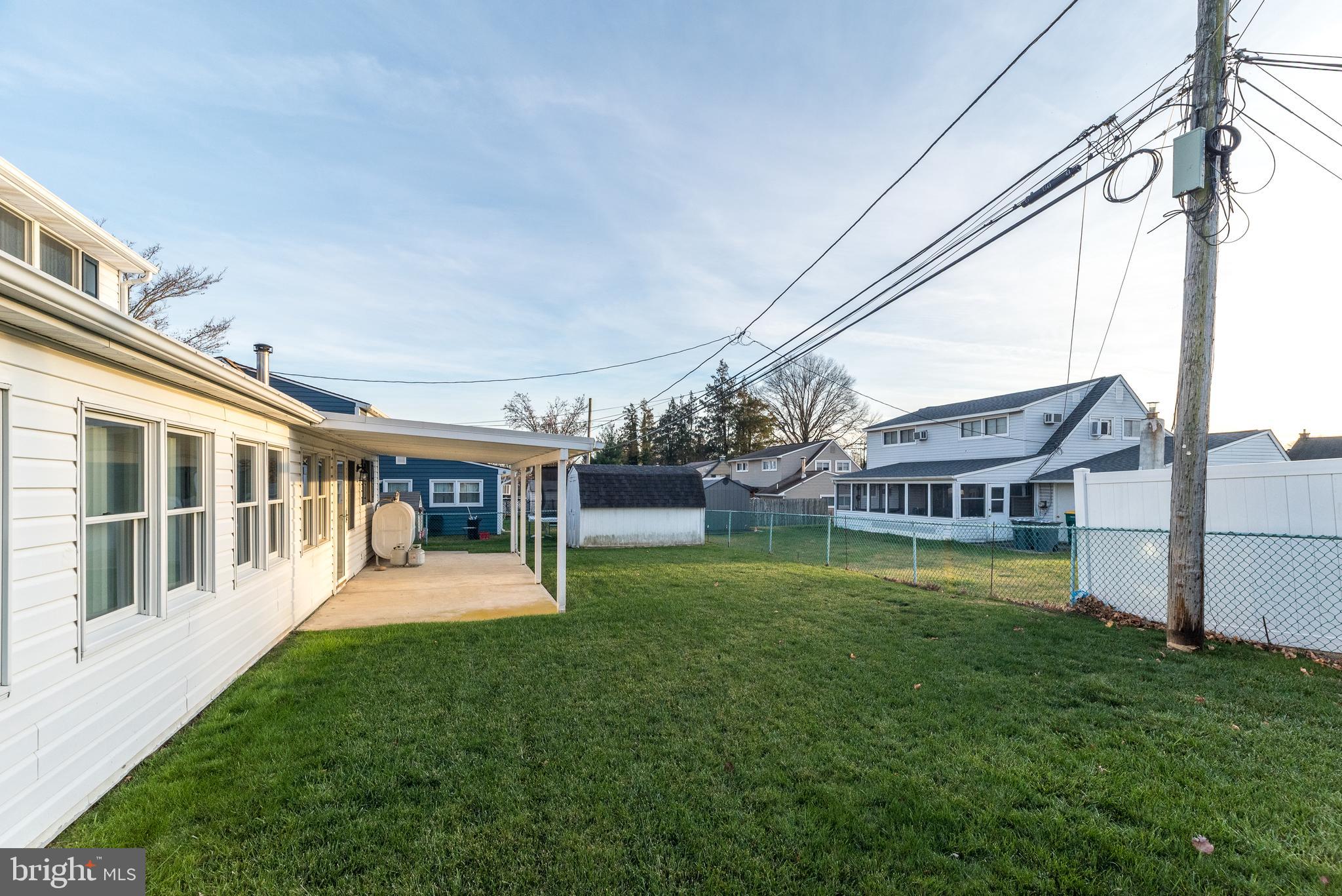 29 Hope Road Levittown, PA 19056 - Photo 48 of 49 a view of a house with a big yard and large trees