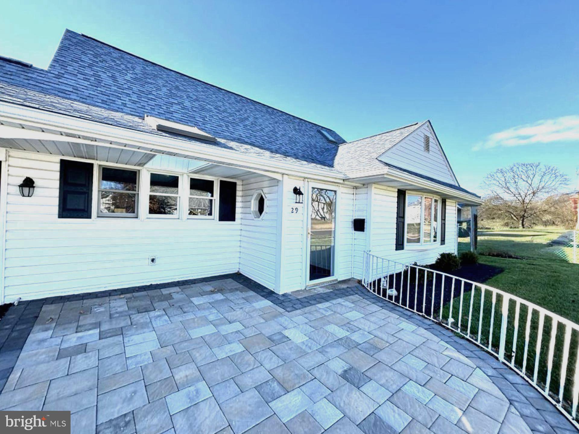 29 Hope Road Levittown, PA 19056 - Photo 5 of 49 a view of a house with backyard and porch