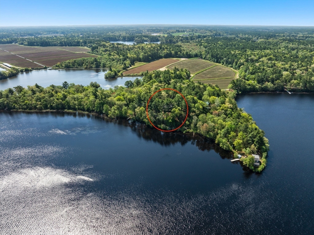 362 Snows Pond Road Rochester, MA 02770 - Photo 34 of 41 a view of a lake with a city