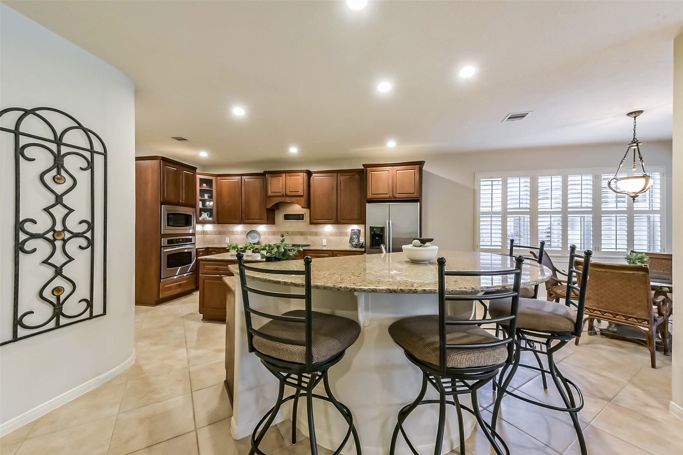 25295 Bull Ridge Drive Porter, TX 77365 - Photo 17 of 50 Open-concept living area offering seamless flow into the kitchen and breakfast area—ideal for entertaining