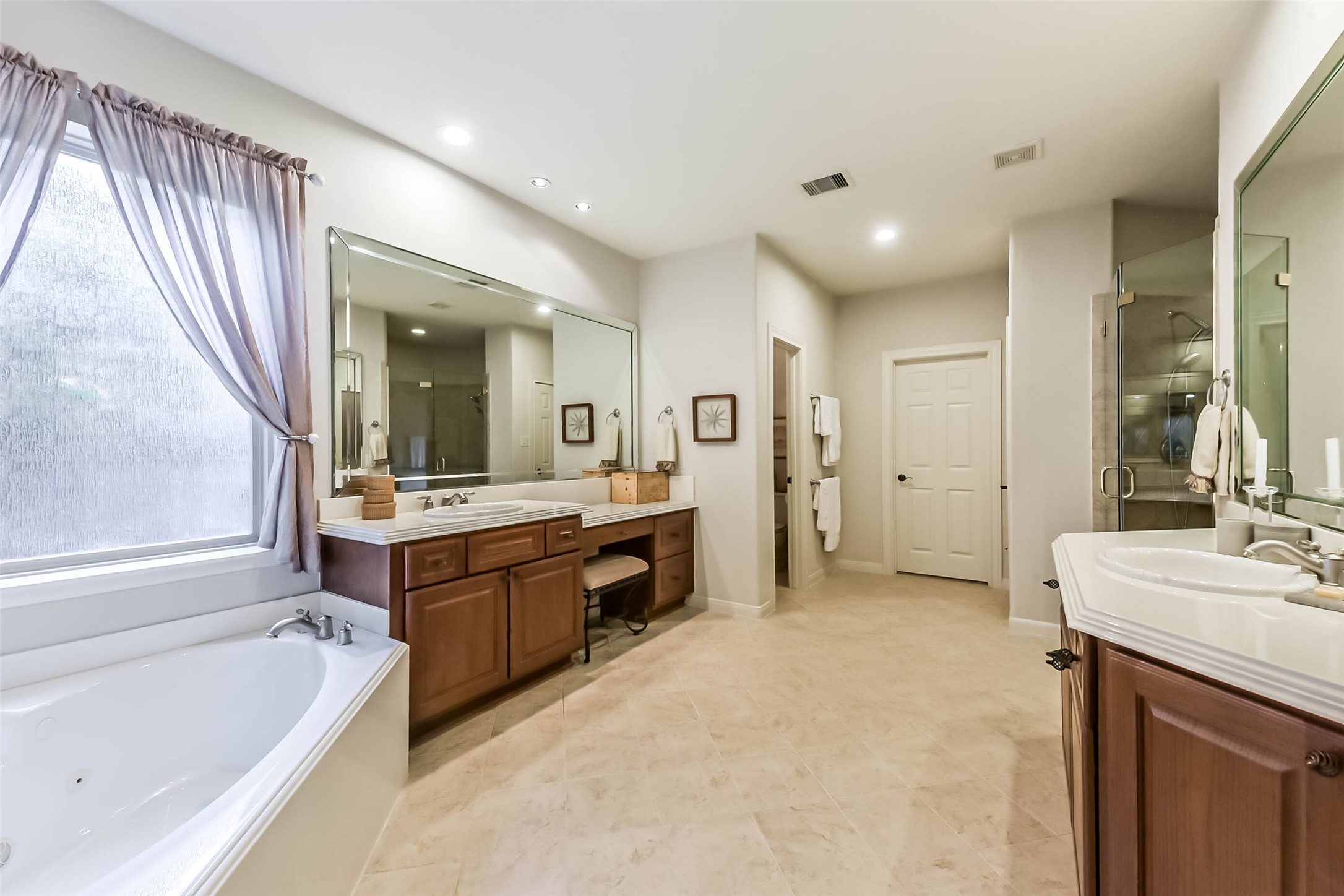 25295 Bull Ridge Drive Porter, TX 77365 - Photo 28 of 50 Large Primary Bathroom with his and hers vanities.