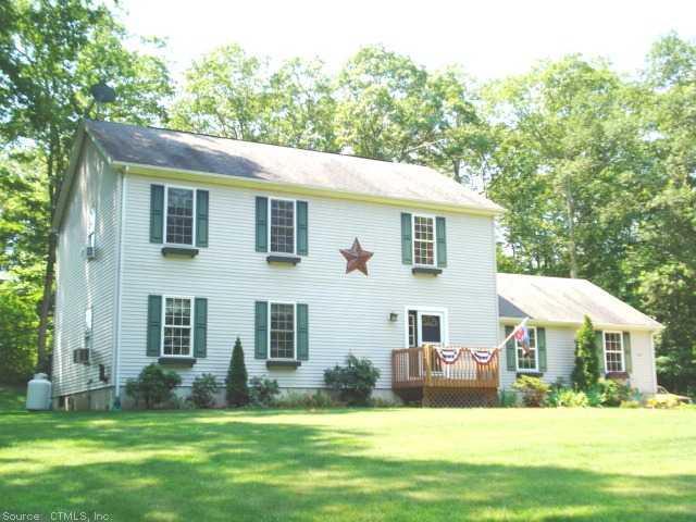 142 Forsyth Road Montville, CT 06370 - Photo 1 of 1 a front view of house with yard and green space