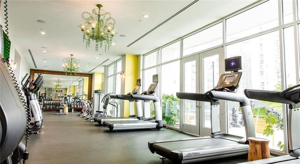 207 13th Street Northeast, Unit S2 Atlanta, GA 30309 - Photo 24 of 46 a view of a room with gym equipment