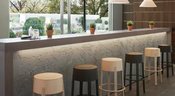 a large dining space with furniture a chandelier and window