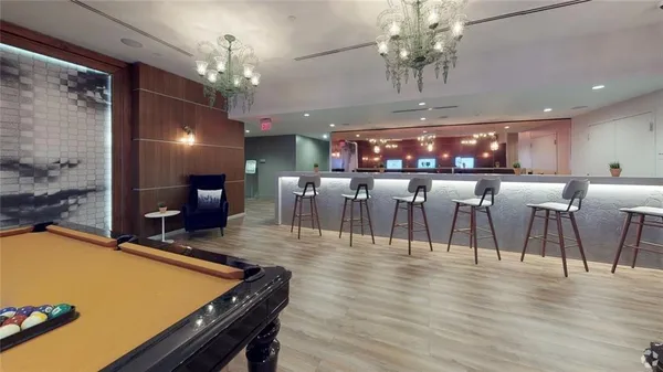 a view of a table and chairs in the patio