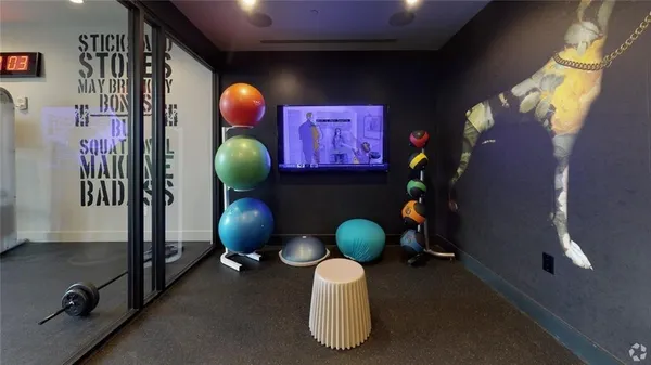 a view of a lobby with a couch and chairs