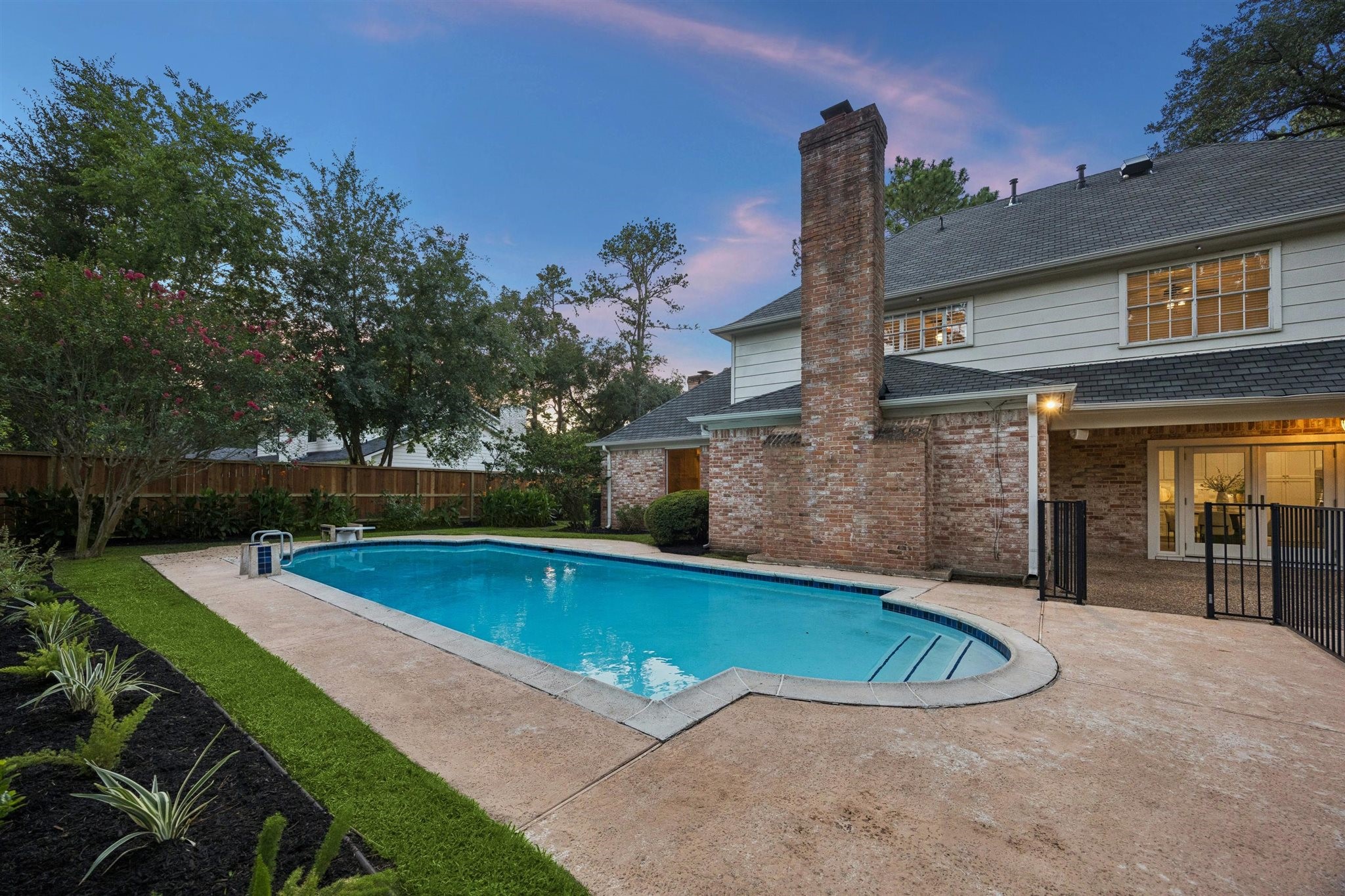 11903 Stoney Ridge Lane Houston, TX 77024 - Photo 37 of 44 An ideal set up with a gated pool area and separate yard