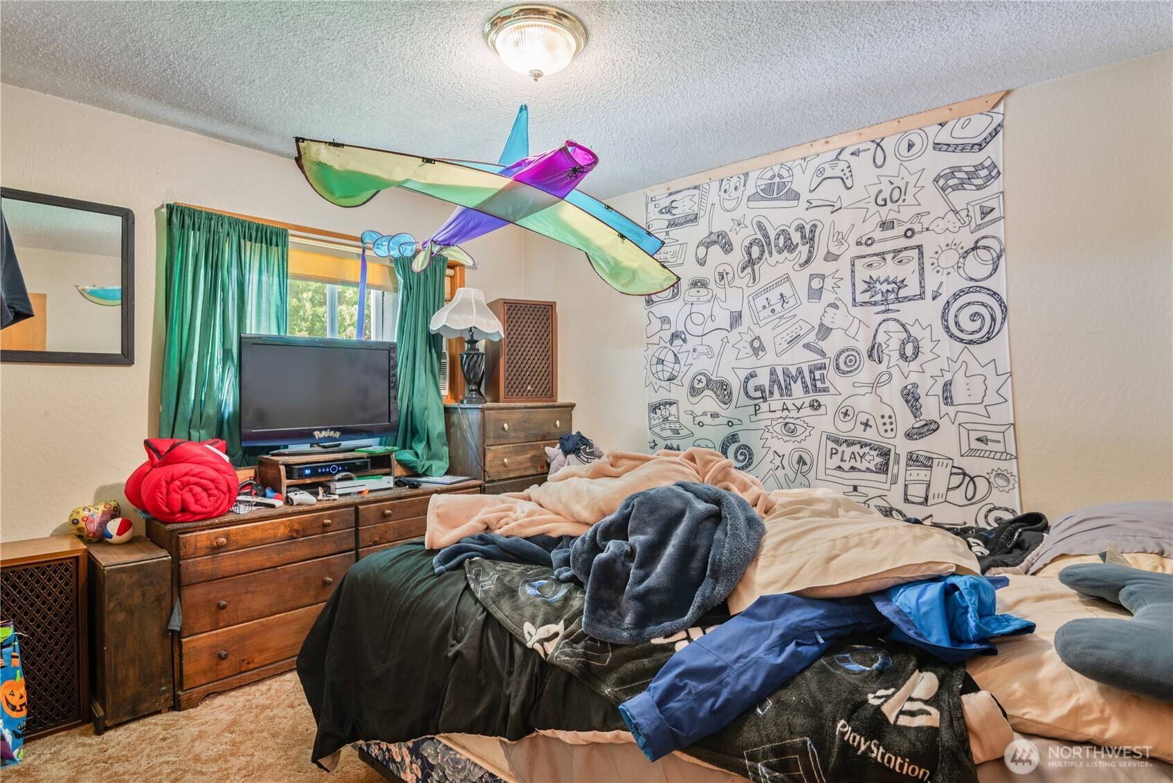 1016 Oak Street Kelso, WA 98626 - Photo 14 of 24 a bedroom with bed and window