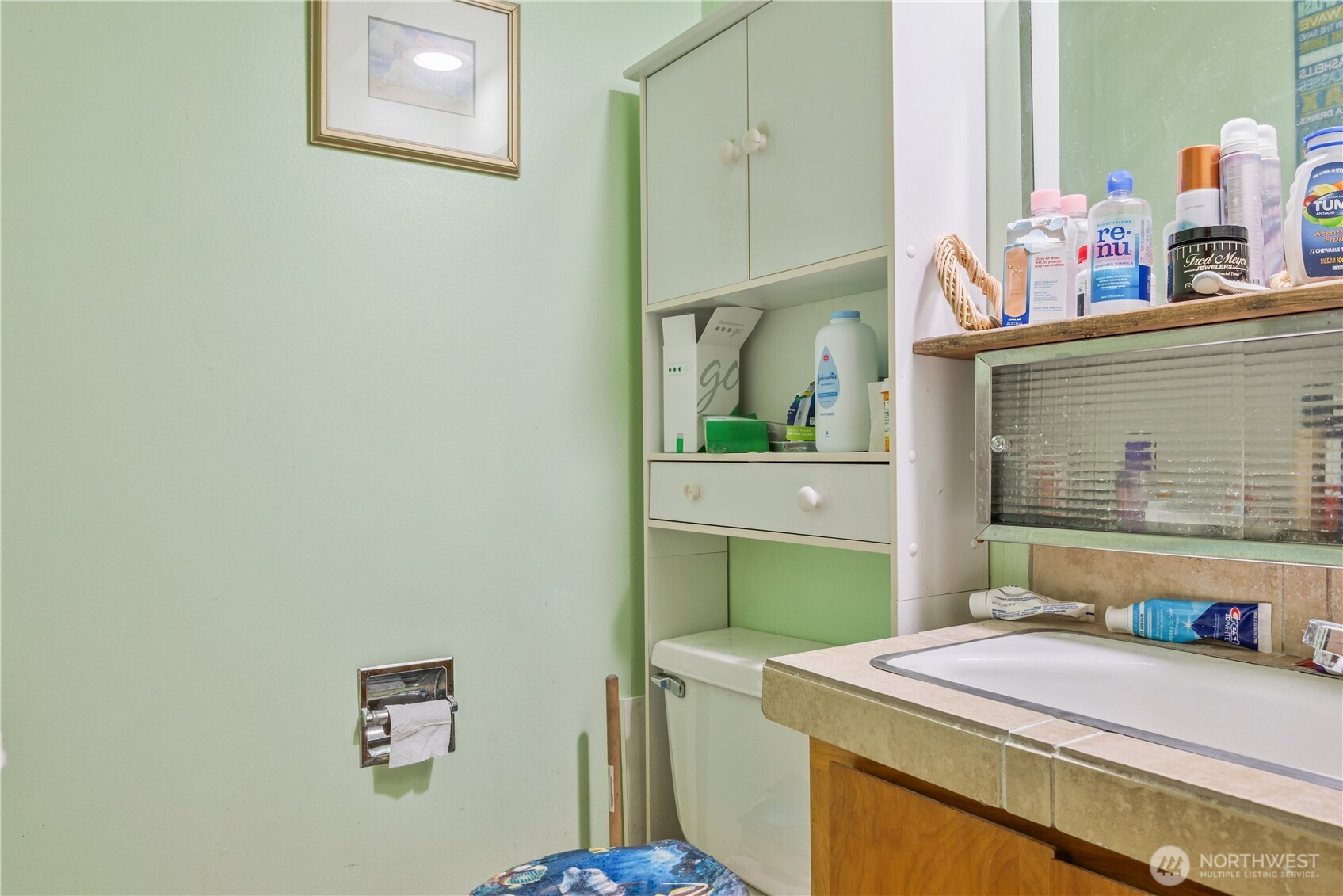 1016 Oak Street Kelso, WA 98626 - Photo 19 of 24 a room with a sink and a mirror