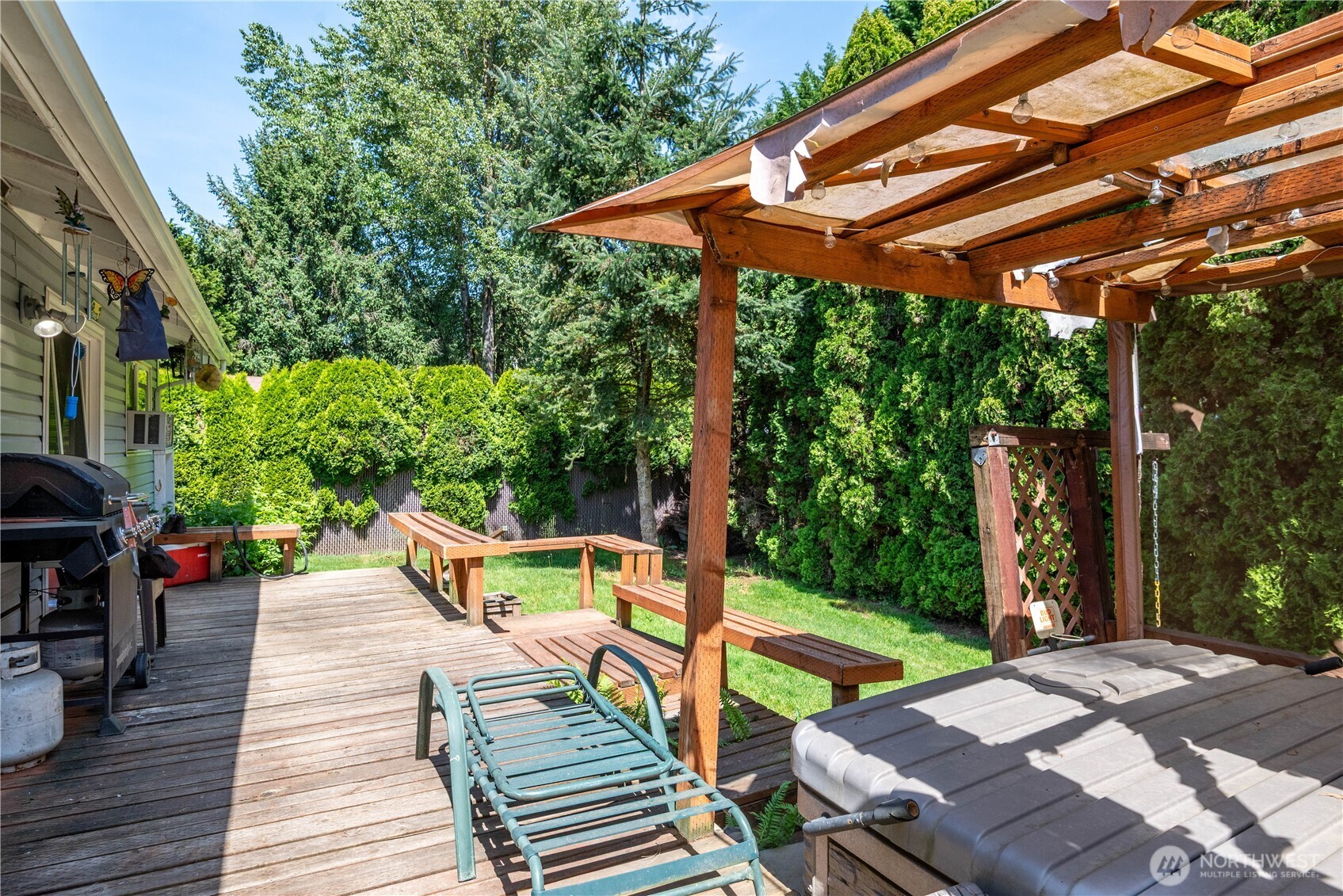1016 Oak Street Kelso, WA 98626 - Photo 22 of 24 a view of outdoor space yard deck patio and swimming pool