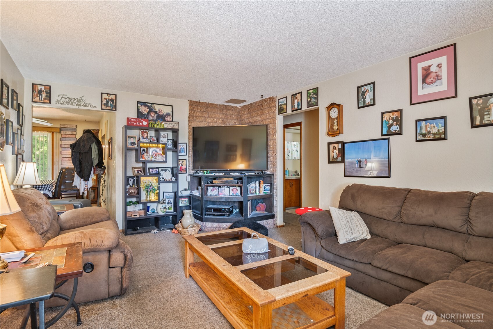 1016 Oak Street Kelso, WA 98626 - Photo 4 of 24 a living room with furniture and a flat screen tv