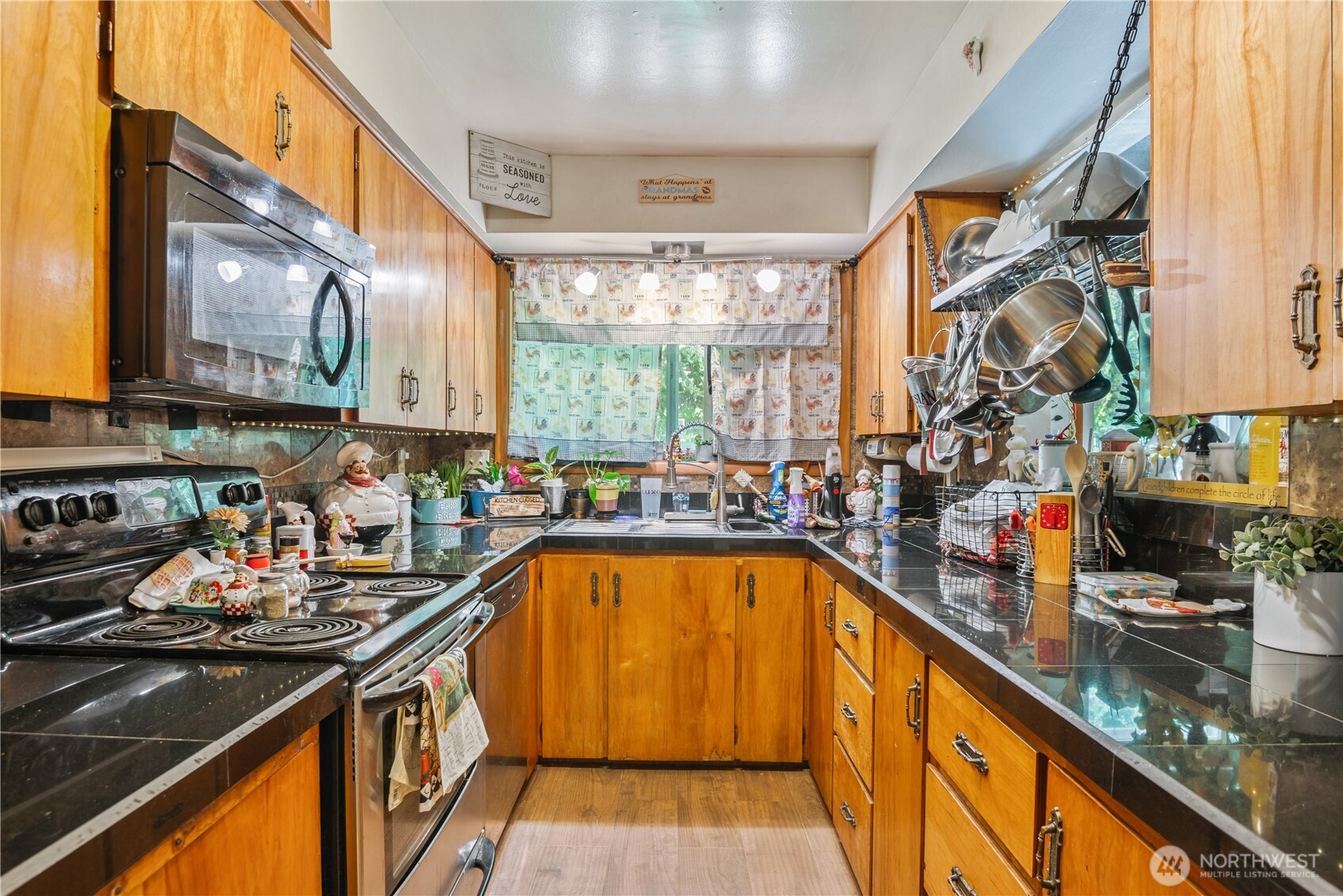 1016 Oak Street Kelso, WA 98626 - Photo 10 of 24 a kitchen with lots of counter top space and a window