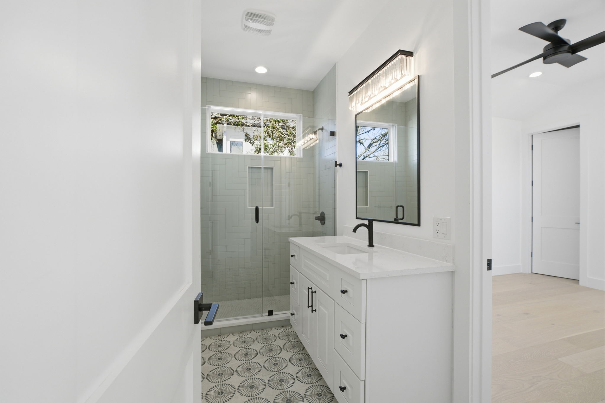 400 Post Rd Drive Austin, TX 78704 - Photo 14 of 23 Full bathroom featuring vanity, ceiling fan, a stall shower, and recessed lighting