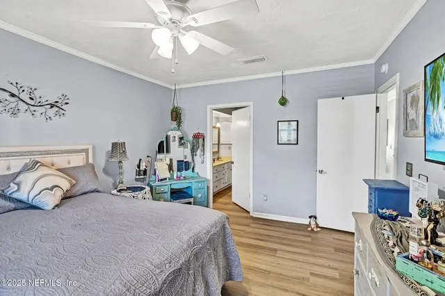 a bathroom with a shower curtain and a sink