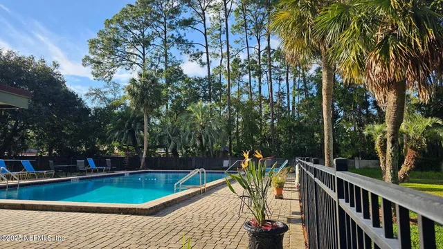 a living room with furniture and windows
